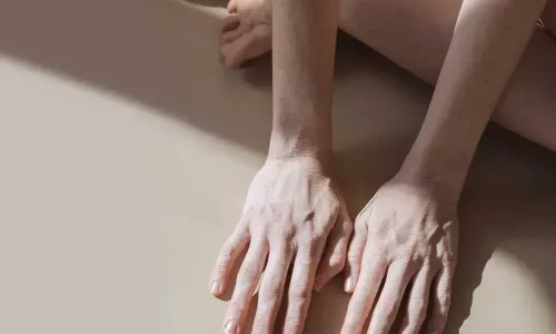 Womans-hands-bathed-in-sunlight